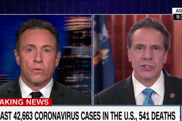 New York Governor Andrew Cuomo, right, is interviewed by his brother, CNN host Chris Cuomo.