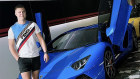 Tyson ‘ASX Wolf’ Scholz with a Lamborghini in a photo uploaded to Instagram in happier times.