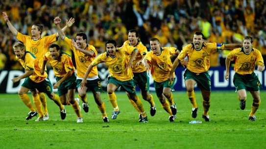 Oh what a night: the Socceroos celebrate after John Aloisi's famous penalty kicked them into a first World Cup in 32 years.