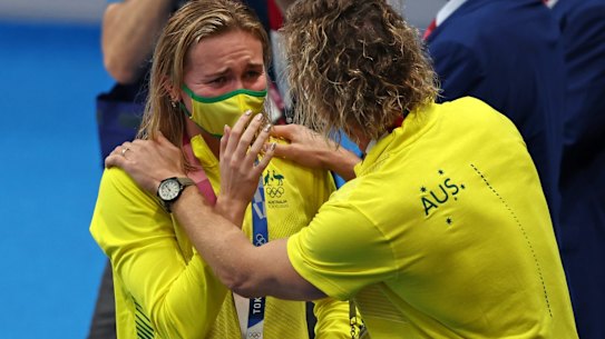Ariarne Titmus with her coach Dean Boxall after her 200m freestyle final win. 