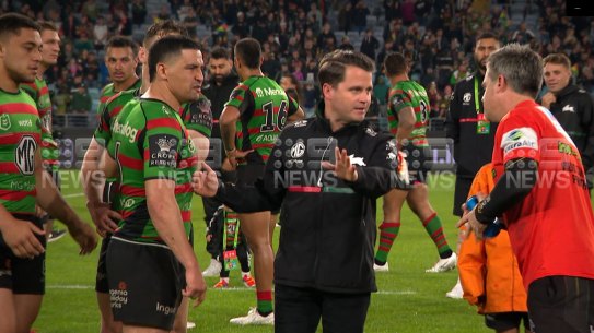 Cody Walker abuses Panthers trainer Pete Green after the game.