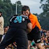 Andrew Alauni (black shirt) competes at a Run It Straight event.