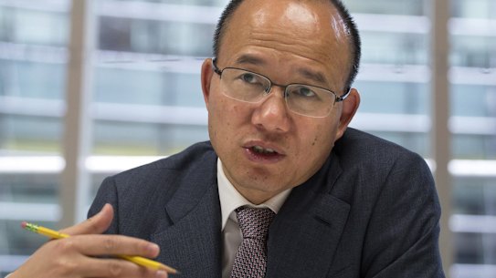 Billionaire Guo Guangchang, chairman and chief executive officer of Fosun Group, speaks during an interview in New York, U.S., on Thursday, April 23, 2015. Guo is the largest shareholder of Shanghai-based Fosun Group, China's biggest closely-held investment firm, with interests in real estate, retailing and gold mining. Photographer: Michael Nagle/Bloomberg *** Local Caption *** Guo Guangchang