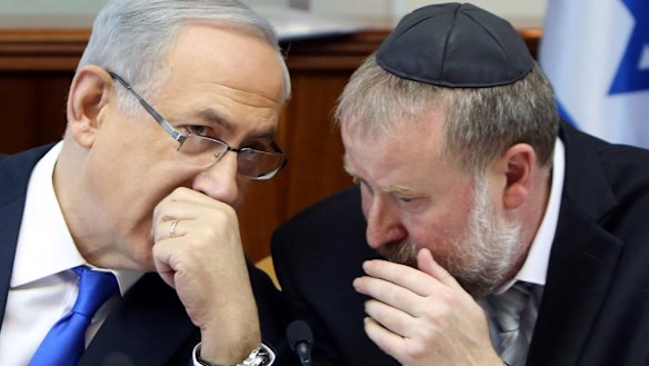 Netanyahu, left, with Avichai Mandelblit back in December 2015.