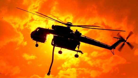 The Erickson air crane, aka Elvis, battles a blaze in Victoria. Two former fire chiefs are concerned such craft will soon be unavailable to Australia.