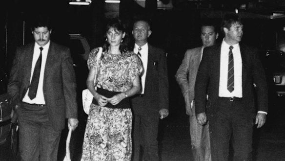 
Detectives involved in the case leave the Glebe Coroner's Court after John Glover is charged with six murders. Left to right, Detectives Barry Keeling, Murray Byrnes, Kim McGee and Geoff Wright, March 28, 1990.
