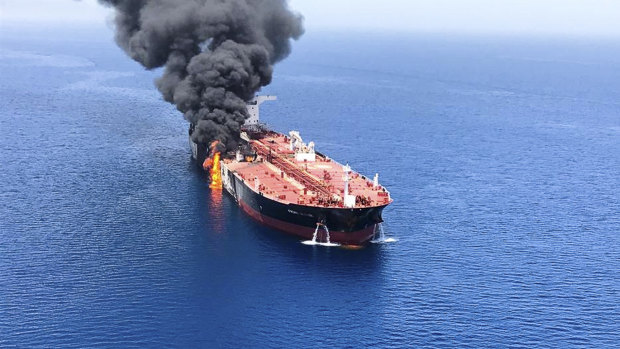 The oil tanker on fire in the sea of Oman.