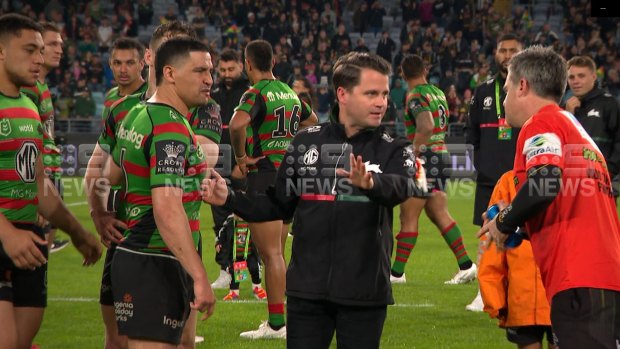 Cody Walker abuses Panthers trainer Pete Green after the game.