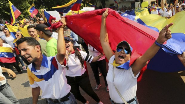 Demonstrators chant "Maduro out" during an anti-government protest against Venezuelan President Nicolas Maduro in Urena, Venezuela.