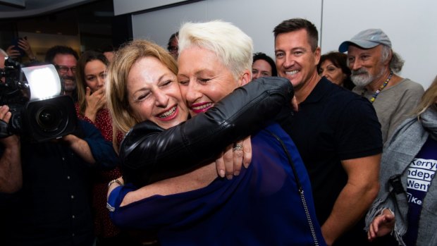 Dr Kerryn Phelps celebrates her win with her wife, Jackie Stricker, on the night of the Wentworth byelection.