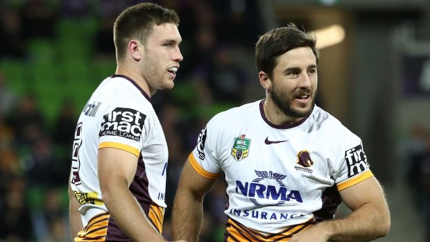 Former Broncos’ players Tom Opacic (left) and Ben Hunt (right) playing for Brisbane against the Melbourne Storm at AAMI Park on August 26, 2016.