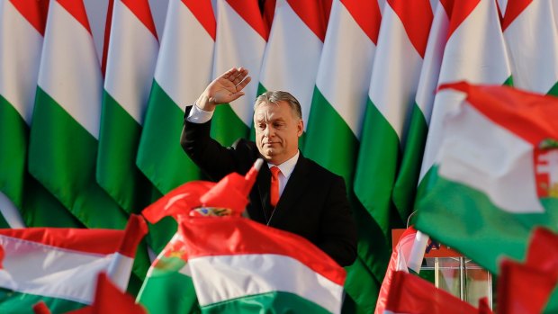Hungarian Prime Minister Viktor Orban waves during the final electoral rally of his Fidesz party last year.
