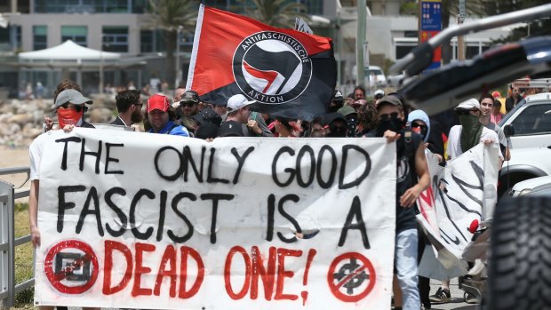 Members of an anti-fascist group in Cronulla at the anniversary of the Cronulla race riots.