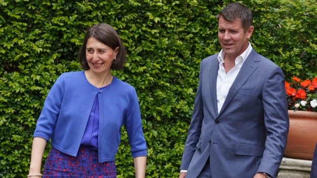 NSW Premier Gladys Berejiklian (left) and former premier Mike Baird. 