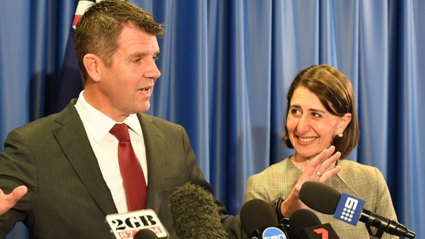Former NSW premier Mike Baird and then Treasurer Gladys Berejiklian announce the lease of Ausgrid in 2016.