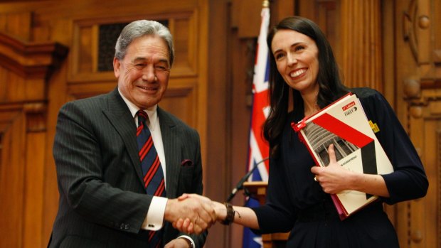 New Zealand First leader Winston Peters and Prime Minister Jacinda Ardern shake hands after signing their coalition agreement in October 2017.