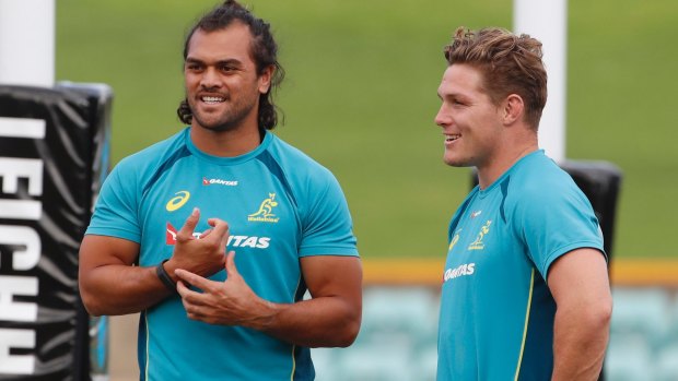 NSW bound? Hunt chats with Michael Hooper during Wallabies training in 2017.