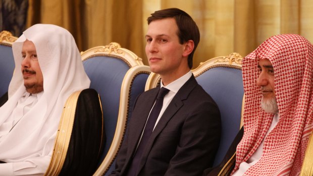 Jared Kushner watches as Donald Trump is presented with The Collar of Abdulaziz Al Saud Medal, at the Royal Court Palace, in Riyadh. 