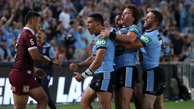 Blues pivot Cody Walker celebrates after scoring a try against the Maroons at ANZ Stadium on Wednesday night. 