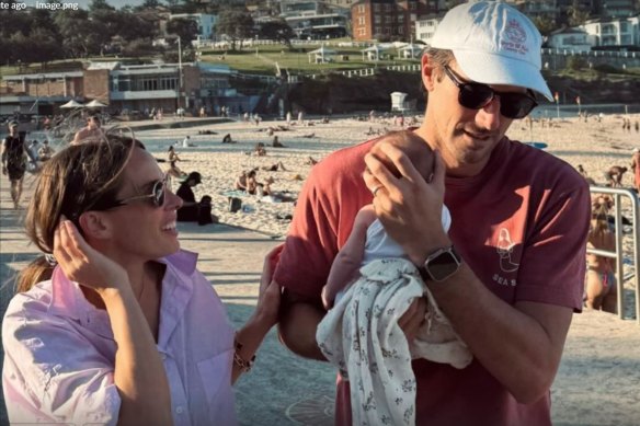 Pat Cummins holds Edith at Bronte Beach in an image shared on both his and wife Becky’s social media. 
