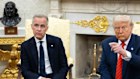 US President Donald Trump, right, and Mark Carney.