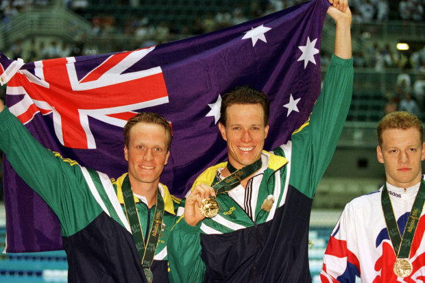 Kieren Perkins (centre) and Daniel Kowalski. 