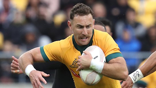 Nic White takes on the All Blacks.