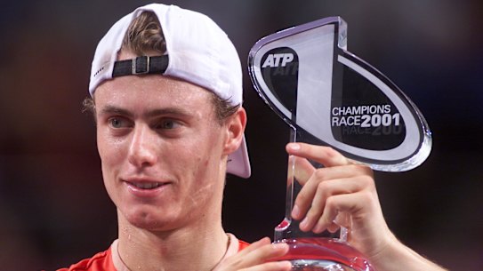 Lleyton Hewitt holding the No.1 trophy after beating Pat Rafter in the Masters Cup.