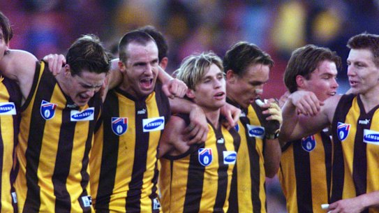 Hawthorn players celebrate after their amazing win.