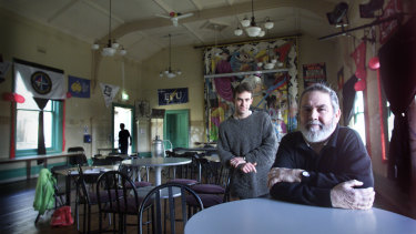 Paddy Garritty in the ballroom of his beloved Melbourne Trades Hall in 2002. Also pictured: Jim Rimmer.