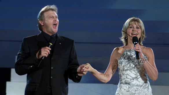 Dare to dream: John Farnham and Olivia Newton-John at the opening ceremony of the 2000 Sydney Olympic Games.