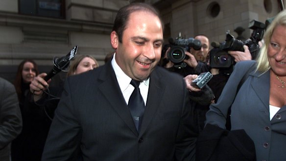 Nicola Gobbo (right) with Tony Mokbel in 2002 after he was released on bail.