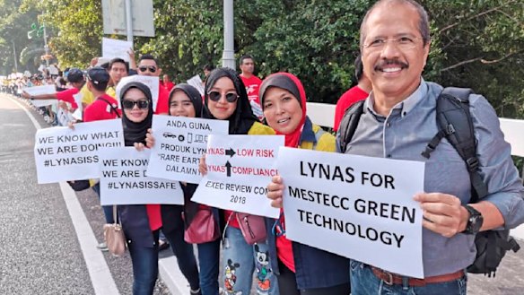 Worker protests outside Malaysian parliament on Wednesday.