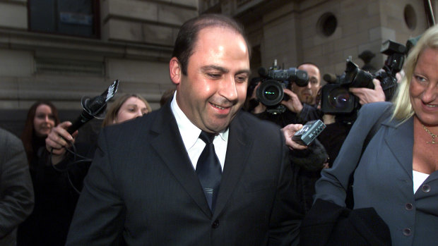 Nicola Gobbo with Tony Mokbel in 2002 after he was released on bail.