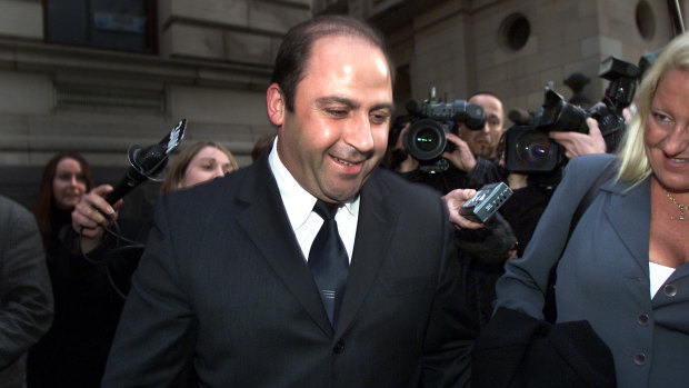 Nicola Gobbo (right) with Tony Mokbel in 2002 after he was released on bail.
