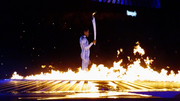 Cathy Freeman ignites the Olympic Flame during the Opening Ceremony.