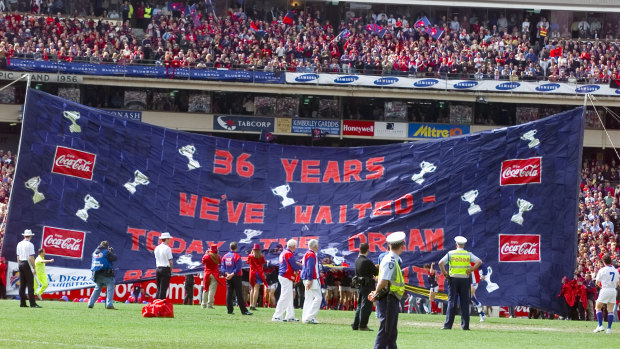 The Demons banner in the 2000 grand final.