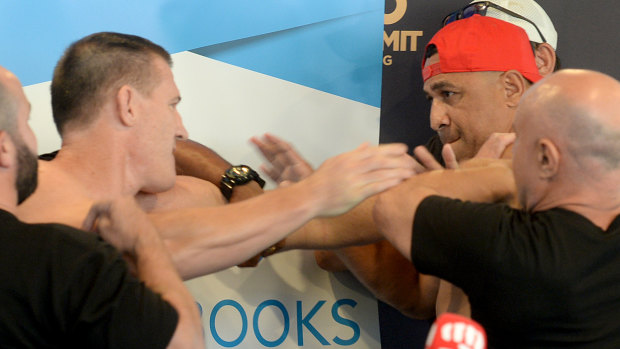 Fisticuffs: Paul Gallen and John Hopoate had to be separated as tensions bubbled over at Thursday's weigh-in. 
