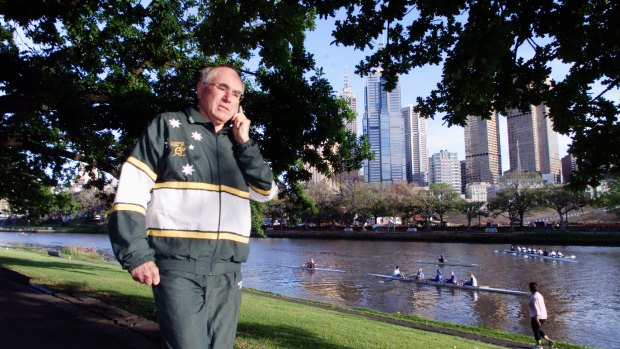 John Howard on a walk in his Wallabies tracksuit in 2001.