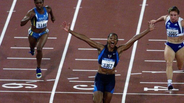 Marion Jones wins the 100m at the Sydney Olympics. 