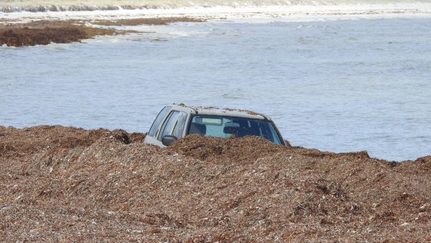 The four wheel drive was bogged in nearly two metres of seaweed.