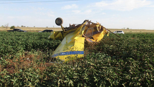 The wreckage of a crop-dusting plane that, according to safety officials, stalled after dumping hundreds of litres of pink water as part of a gender reveal celebration, near Turkey, Texas.