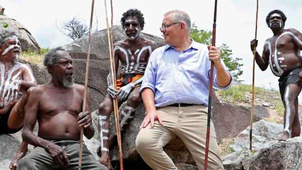 Prime Minister Scott Morrison with the people of the Guugu Yimithirr tribe at Reconciliation Rocks, Cooktown.