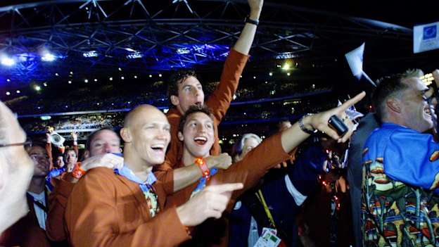 Michael Klim, Ian Thorpe and Grant Hackett enjoying the closing ceremony.