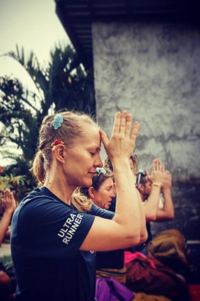 The runners pray for a safe race.