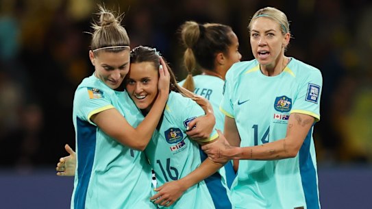 MELBOURNE, AUSTRALIA - JULY 31: Hayley Raso (2nd L) of Australia celebrates with 
