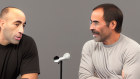 Fake Joe Rogan and fake Steve Jobs make a podcast. Image created using Stable Diffusion.