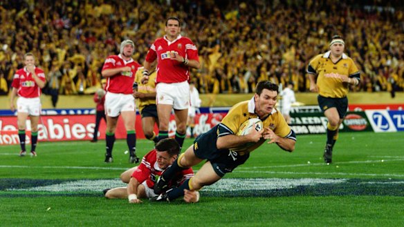 Daniel Herbert scoring in 2001 on the way to a Wallabies series win.