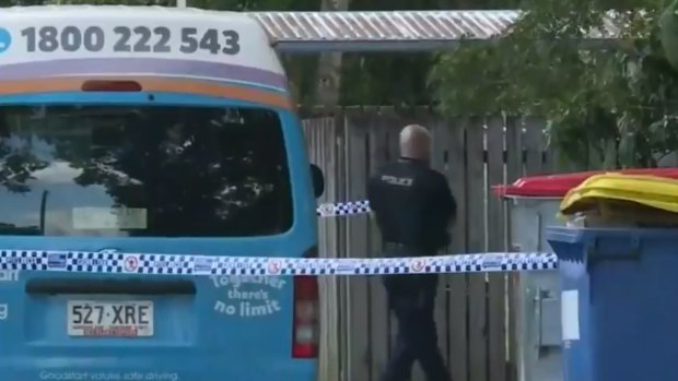 Police have laid charges after the boy's body was discovered on the minibus in Cairns.