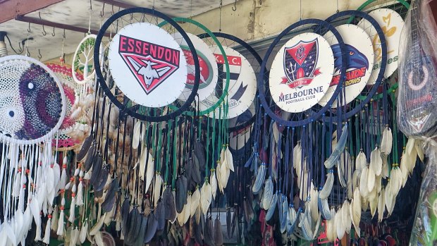 Dreamcatchers decorated with AFL logos targeting Australian tourists at a shop in Kuta.
